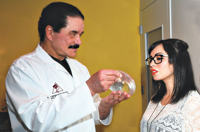 Veronica Campbell gets a consultation on silicone breast augmentation from Dr. Larry