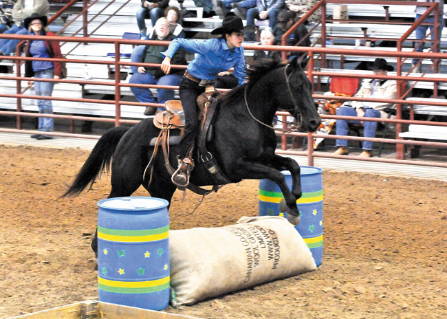 Elena Aoki charges through an obstacle at the EXCA 2013 World Championships in Hamilton, Texas. Photo from Celma Aoki.