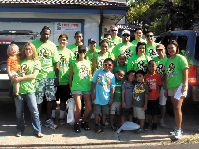 Kahala Associates' Aileen Rodriguez-Chizer (front, far right) with her 2012 team in East Oahu. Her crew will collect door-to-door again Nov. 9 for Hawaii Foodbank. Photo from Liane Hu.