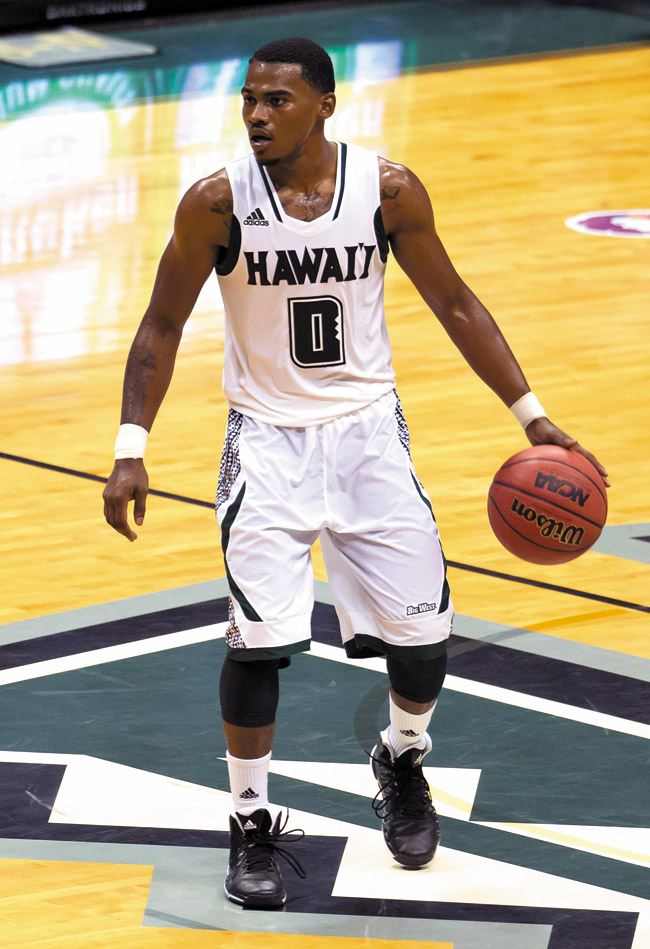 Hawaii guard Keith Shamburger sets up the offense against Boise State last month. AP photo/Eugene Tanner
