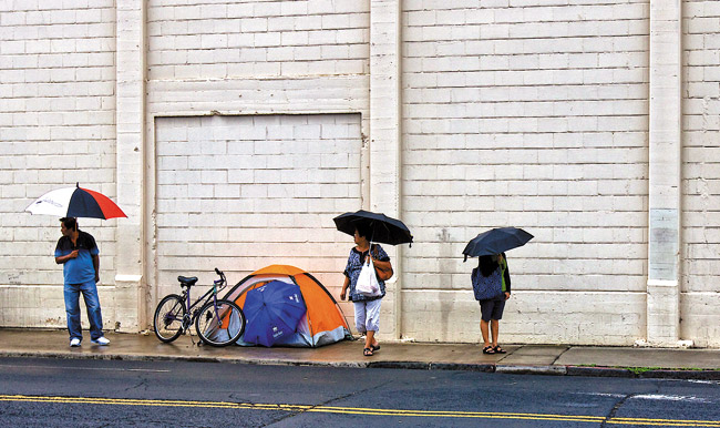 Many of Oahu’s homeless call city sidewalks home | Jade Moon photo