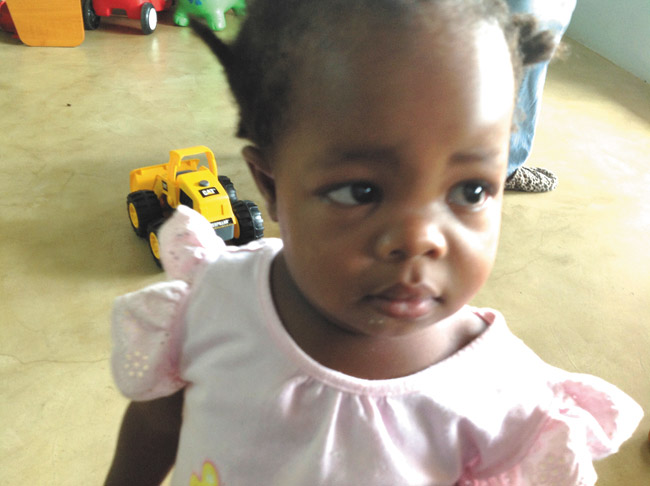 This baby Oprah look-alike was allowed by her grandfather to live at Project Canaan. Photos from Susan Page