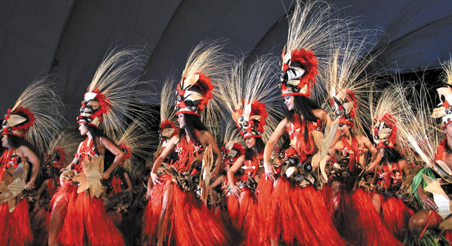 Tahitian dancers in splendid costume (last year) again will take the stage at Heiva I Honolulu Tahitian dance competition. Photo by Mike Bambi