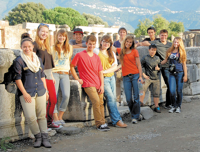 Trinity Christian School seniors explored Pompeii during their Grand Tour of Europe last fall. The travelers are (front, from left) Allie Murakami, Zoe Wilks, Jennifer Jacobsen, Timothy Metcalf, Mary Trahey, Amaris Capen, Nalani Meinken, Jessica Williams, Bobby Treakle, (back) Shaun Kanoho, Gabriel Arney and Ethan McGuire. This is way before they had to prepare for their senior theses, which each of them will present this week before judges at the Kailua school. Photo by Marcia Murakami.
