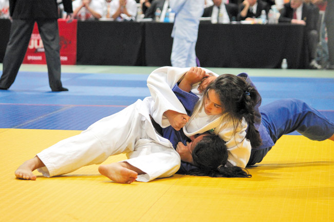 Shaena Peralto controls an opponent at the 2014 Junior National Championship, July 4 at the Blaisdell Arena PHOTO FROM MILILANI JUDO CLUB
