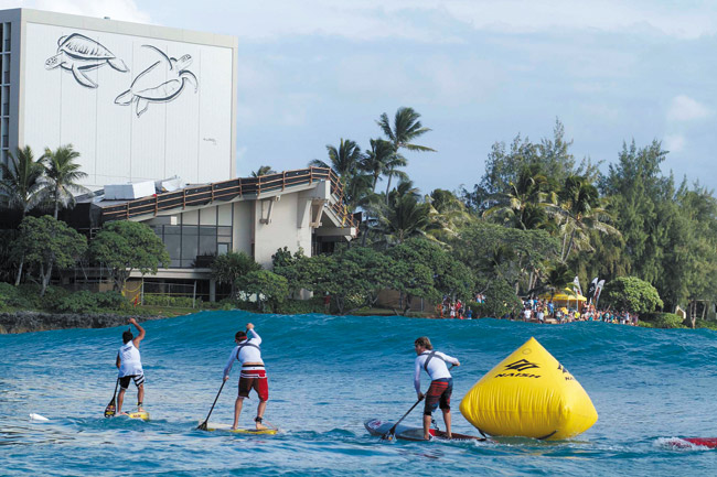Turtle Bay Resort ambassador Kai Lenny (far left) won last year's Stand Up World Series finals, which the resort will host again Oct. 10-12. Competitors from more than 20 countries are expected. Photo courtesy Hank Fotos, Watermen League.