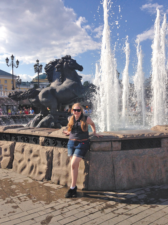 Zoe Sprott poses in front of a fountain near Red Square in Moscow. The teen traveled to Russia to study the language. Photo from the Sprott family.