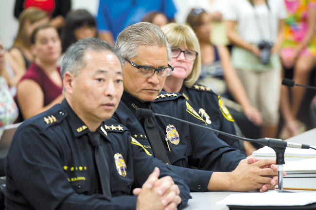 HPD Deputy Chief Dave Kajihiro (from left), Chief Louis Kealoha and Deputy Chief Marie MacCauley answer questions Sept. 30 at a legislative hearing on domestic violence STAR-ADVERTISER PHOTO BY CRAIG T. KOJIMA
