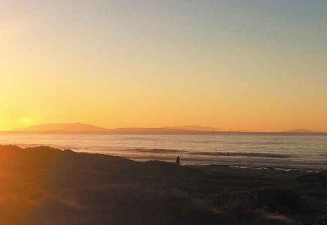 Sunrise in East Honolulu — Molokai, Lanai and Maui in the distance RON MIZUTANI PHOTO