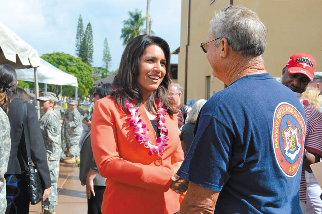 After speaking at the Oct. 31 dedication of Schofield Barracks' Warrior Transition Battalion Headquarters and Soldier & Family Assistance Center, U.S. Rep. Tulsi Gabbard met with veterans and service members attending the ceremony. Photo from Gabbard's office.