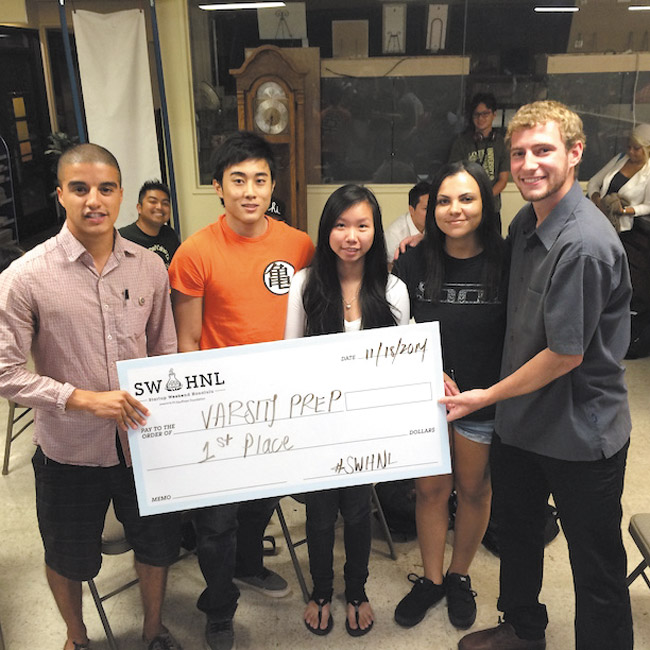 Startup Weekend's winning team (from left) Italo Robinson, Ranson Namba, Jenny Nguyen, Te Valle and David Holt. Namba, Nguyen and Valle are DevLeague students PHOTO BY RUSSEL CHENG