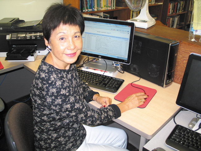 Grace Au practices using email at an Ohana Komputer class OHANA KOMPUTER PHOTO