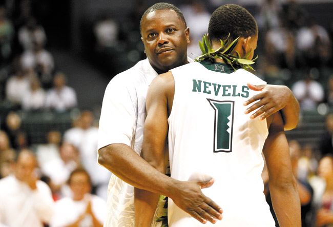 Hawaii head coach Benjy Taylor hugs Hawaii guard Garrett Nevels during Senior Night festivities following a loss to UC-Santa Barbara in the Rainbow Warriors' final home game JAMM AQUINO PHOTO/HONOLULU STAR-ADVERTISER