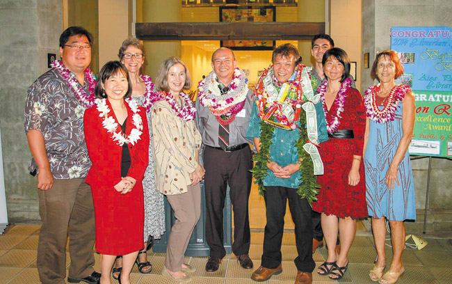 Present at Friends of the Library of Hawaii (FLH) 2014 Excellence in Service (EIS) Award celebration Feb. 19 were (from left) FLH officials Keith Oda, Lynnae Lee, Marlene Booth and Jane Dickson, Public Librarian of the Year Baron Baroza, EIS awardee Don Ramos, FLH official Nainoa Mau, interim state librarian Stacie Kanno and FLH official Rebecca Nadler. Photo courtesy FLH.