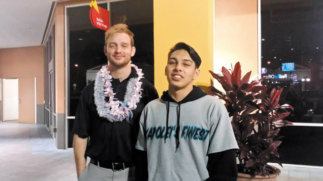 Kapolei High wrestler Shandon Ilaban (right) with coach Sean Salter. Photo courtesy Shandon Ilaban.