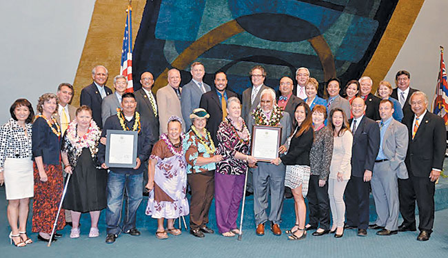 The state Senate honored the late Albert ‘Uncle Al' Lewis April 1, with his family present. In the front row are (second from left) Sen. Laura Thie-len, widow Florence Mae Bowers Lewis and son David Lewis. (Art Frank, front, center, also was honored.) PHOTO FROM SEN. THIELEN'S OFFICE.