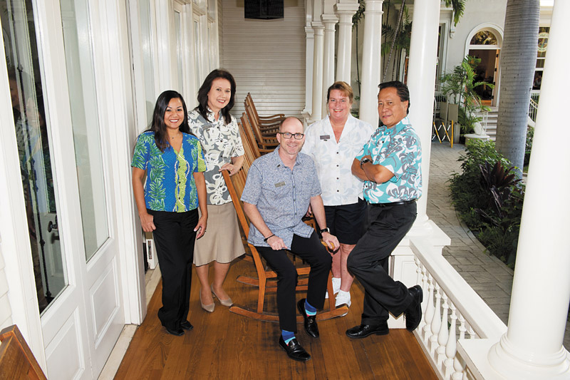 It's a magical place on Waikiki Beach, but what makes the Moana special is the people, including (from left) Roxanne Momohara, tour and activity consultant (13 years), Marian Lima, front desk supervisor (36), Larry Hanson, general manager (2), Nancy Gorospe, fountain dispenser (27) and Raul Tan, housekeeping supervisor (37)