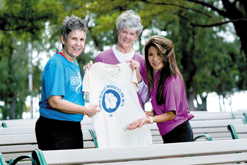 Carlberg, Beams and Tong hold a finisher's shirt from the first Women's 10K in 1978