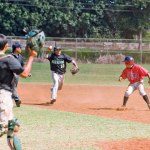 Kauaiâ€™s Matthew Ebueng is caught in a pickle as his attempt to steal second base is thwarted